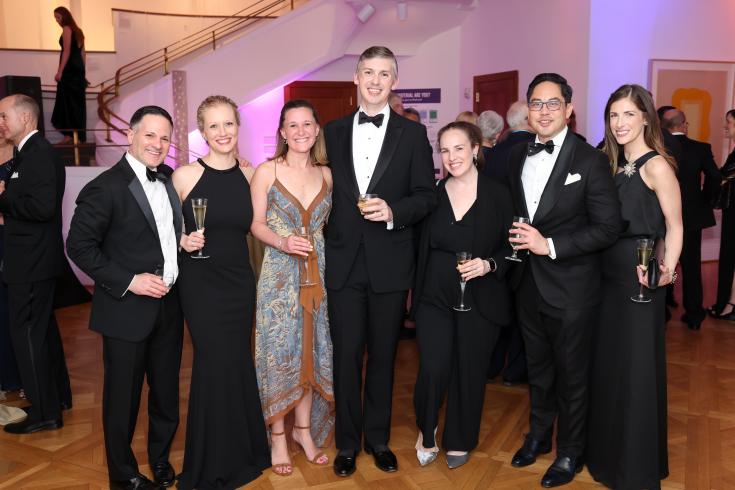 Group of seven people in black tie at The Phillips Collection gala